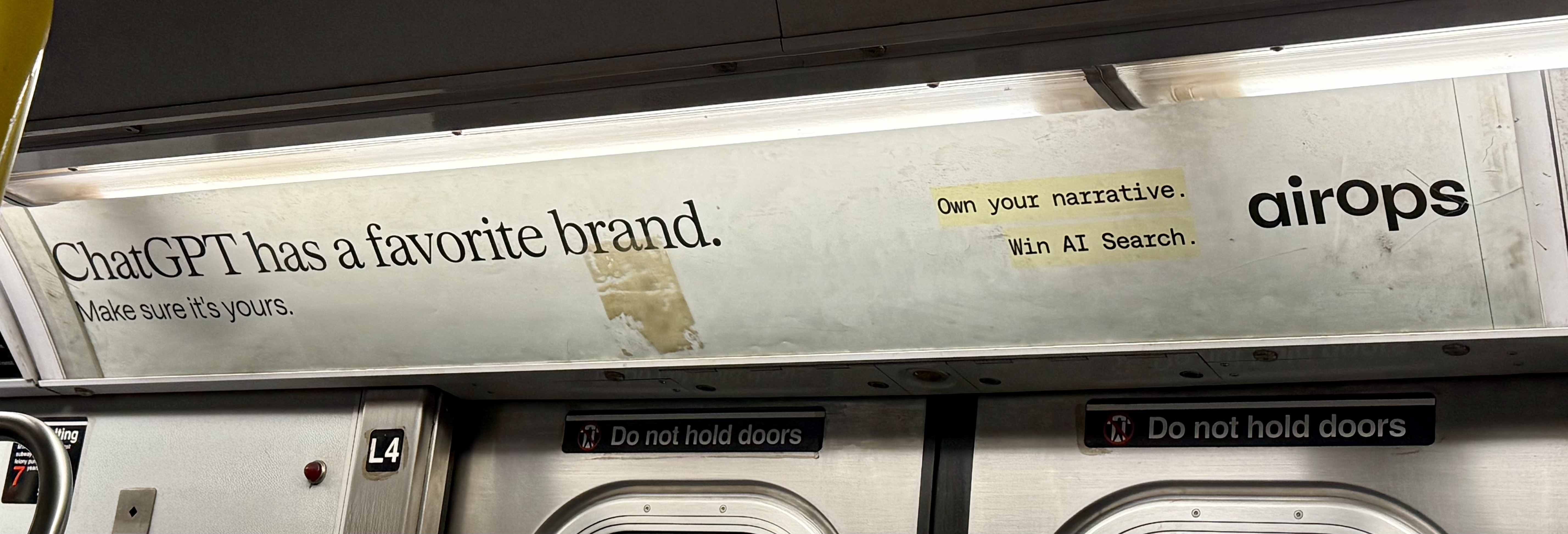 Subway ad from AirOps that reads: ChatGPT has a favorite brand. Make sure it's yours. Own your narrative. Win AI Search.